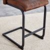 A set of two brown chairs, including suede cushions and black metal legs. Small size, suitable for select groups, suitable for dining room, kitchen