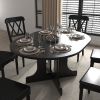 Dining Table for Farmhouse Kitchen 59x43 Inch Expandable Oval Table Top with Removable Leaf Trestle X Shaped Base Black