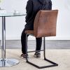 A set of two brown chairs, including suede cushions and black metal legs. Small size, suitable for select groups, suitable for dining room, kitchen